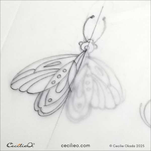 Make your butterfly symmetrical using tracing paper -3