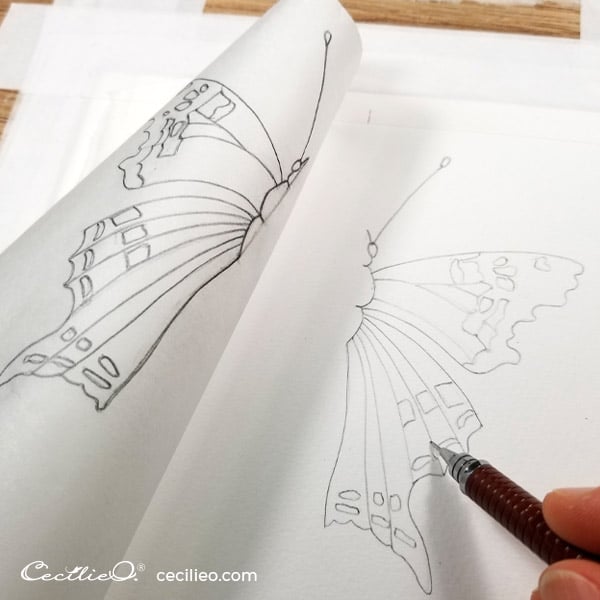 Transfer the drawing with tracing paper.