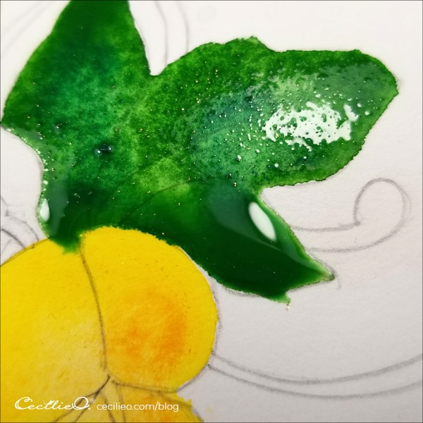 Painting the leaves green with abundant  water.