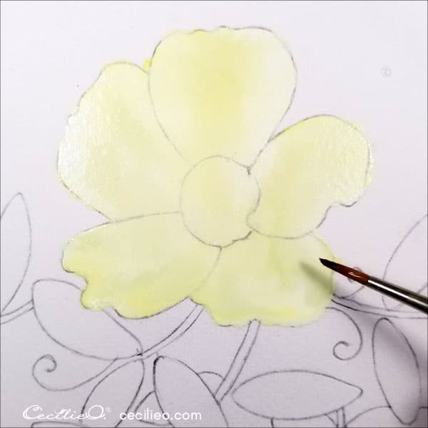 Painting petals with pastel yellow