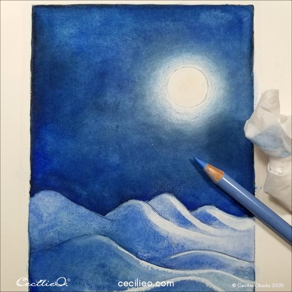 Dimming the light around the moon with colored pencil. 