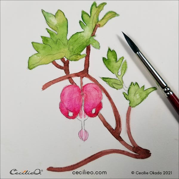 Activating the pink watercolor pencil with water. 