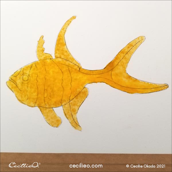 Fish painted with watercolor yellow and ochre.