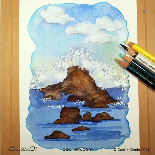 Adding fresh turquoise and light 
yellow to the sky with colored pencils. 