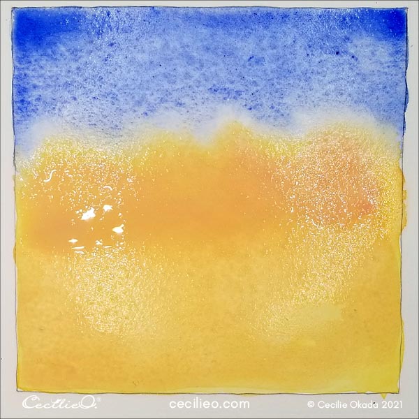Painting with yellow and pink watercolors for a golden sunset.