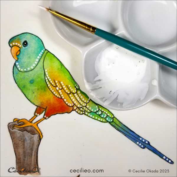 Decorating the watercolor parrot with white dots of gouache.